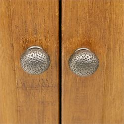 Contemporary pine hanging wardrobe, twin panelled doors enclosing open hanging space with brass rail, two drawers to lower section, on moulded plinth base