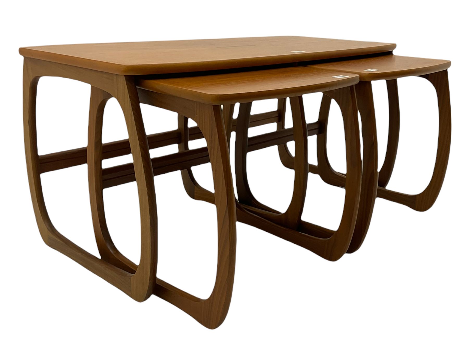 Nathan - teak Long John nest of tables and a singular nest of tables 