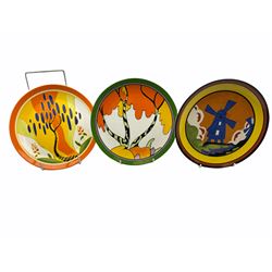 Seven limited edition Wedgwood Clarice Cliff plates, comprising Orange Roof Cottage, Caravan, Windmill, Windbells, Summerhouse, Honolulu and Bridgewater D20.5cm. 