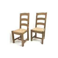 Pair oak ladder back chairs with rush seats