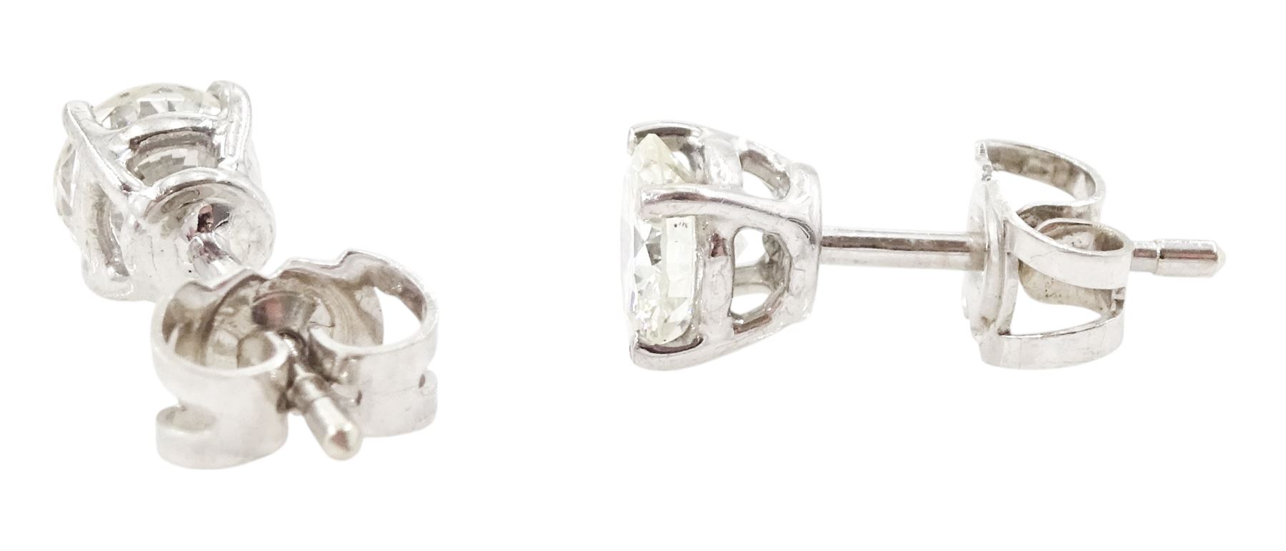 Pair of 18ct white gold round brilliant cut diamond stud earrings, total diamond weight approx 1.20 carat