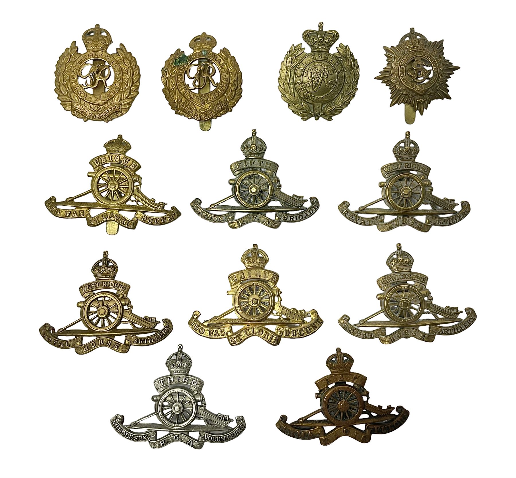 Twelve cap badges including Royal Artillery, 3rd RGA Middlesex Volunteers, Hon. Artillery Company, West Riding and Waraickshire Royal Horse Artillery, Royal Engineers and Army Service Corps (12)