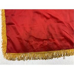 1960s North Vietnam banner embroidered in yellow thread on a red ground, roughly translates as 'Peoples Army of Viet Nam. Warriors of Viet Nam Determined To Keep The Country 1964' around a central military crest with the motto 'Warriors Keep The Country'; tassels to three sides 70 x 100cm
