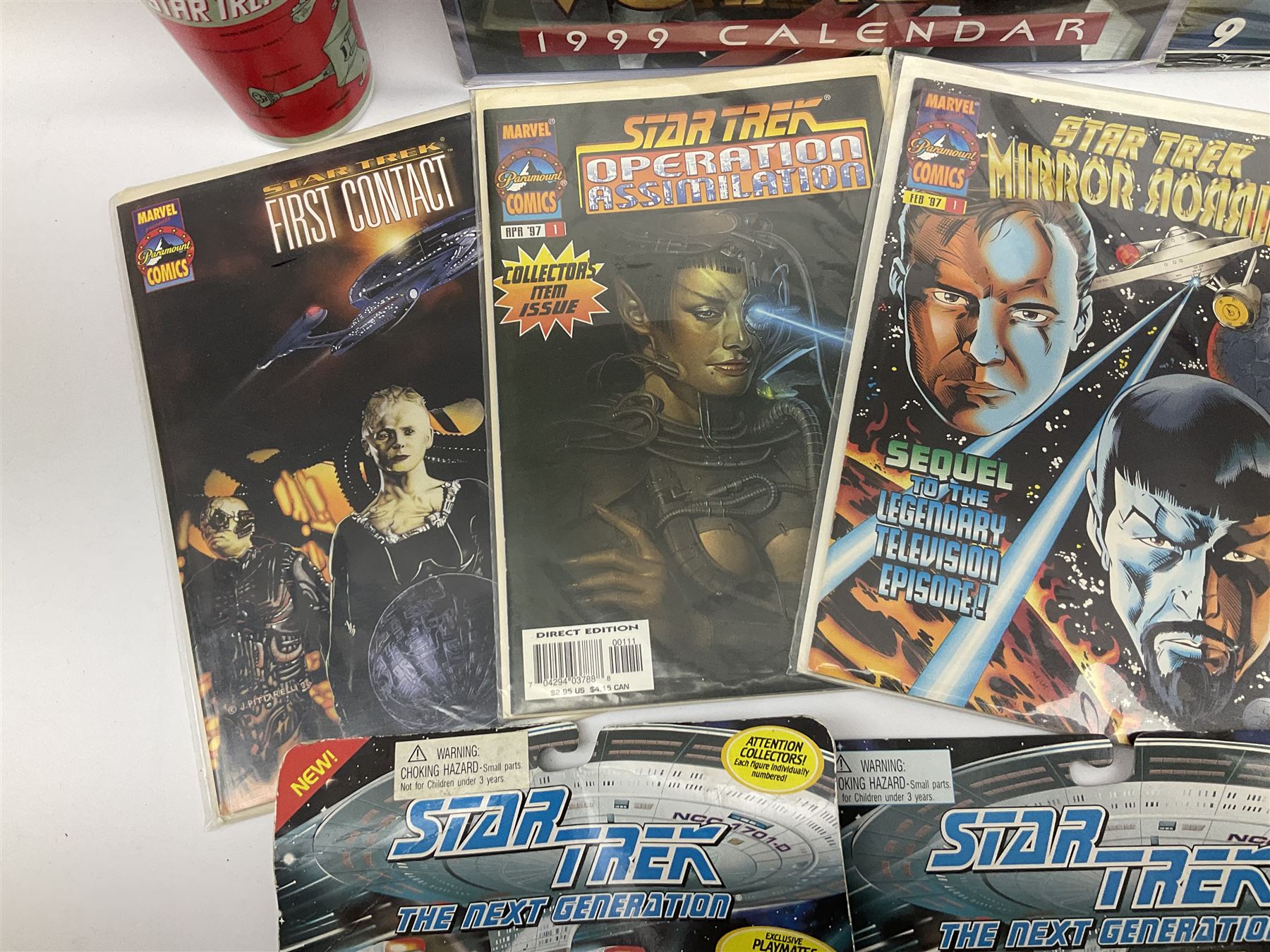 Quantity of Star Trek memorabilia and promotional merchandise including action figures, calendars, mobile kit, collector's fact cards, models etc; many in original packaging