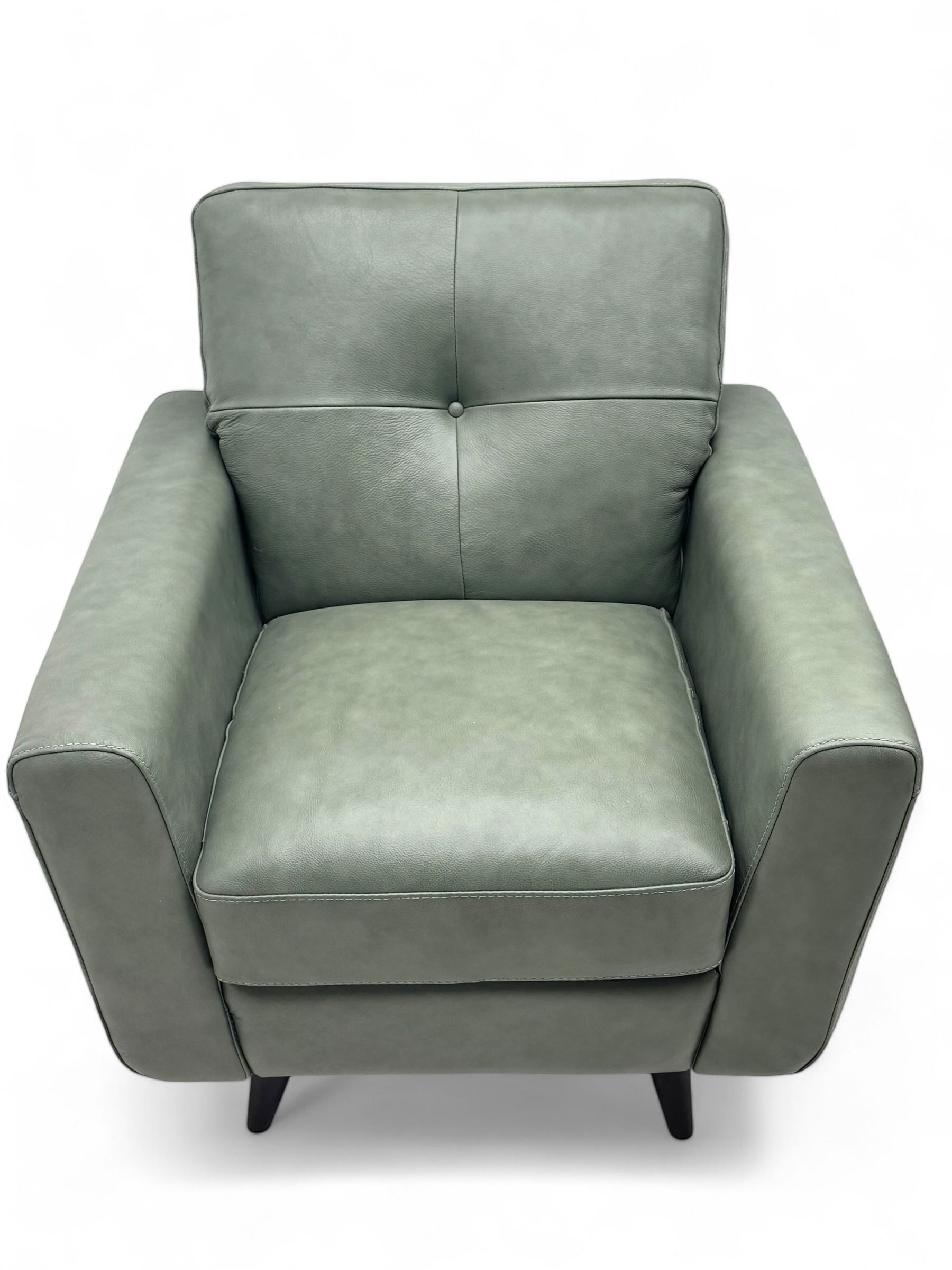 DFS - contemporary 'Camper' two seat sofa, upholstered in French grey leather with button back detailing, on splayed supports (W144cm, D84cm, H76cm); matching armchair (W90cm, D84cm, H76cm)