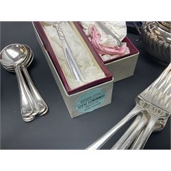 Mother of Pearl handled cutlery, with silver ferrules, comprising six fish knives and forks and six fruit knives and forks, the ferrules hallmarked Yates Brothers, Sheffield 1905, together with silver plated Edwardian three piece tea service and other flatware 