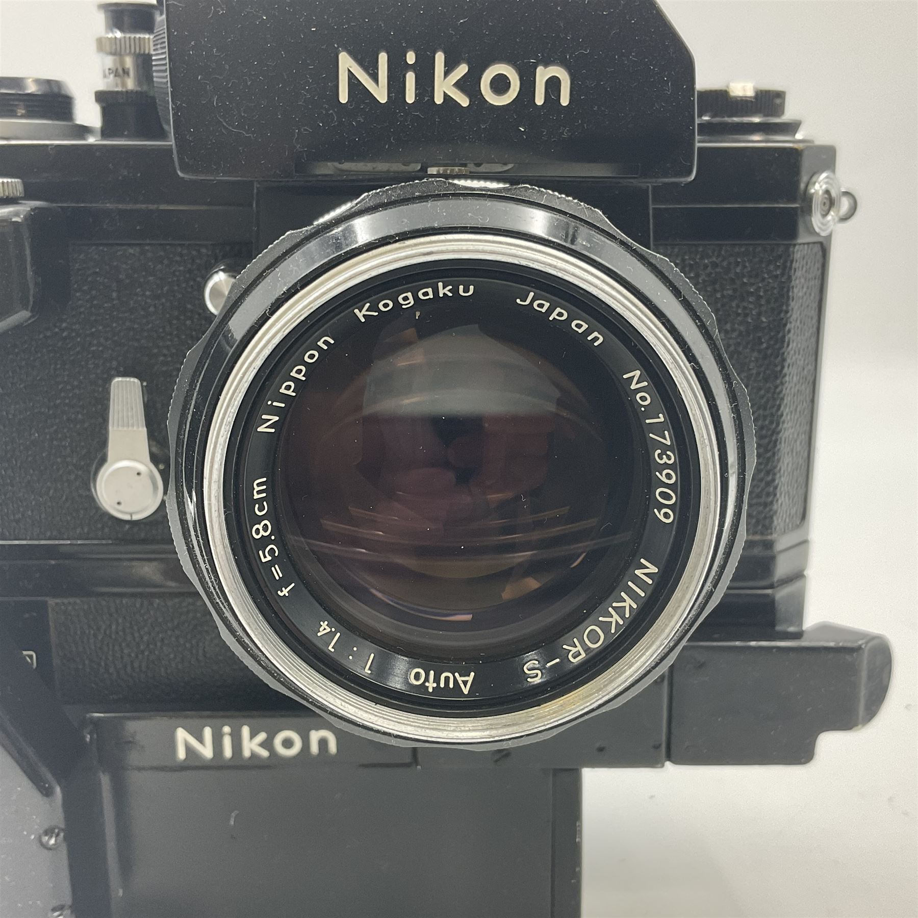 Nikon Photomic TN NKJ camera body, serial no 6728309, circa 1965, with 'Nippon Kogaku NIKKOR-S Auto 1:1.4 f=5.8cm' lens, serial no. 173909, Nikon F36 Motor Drive, serial no.132430 and Nikon cordless battery pack