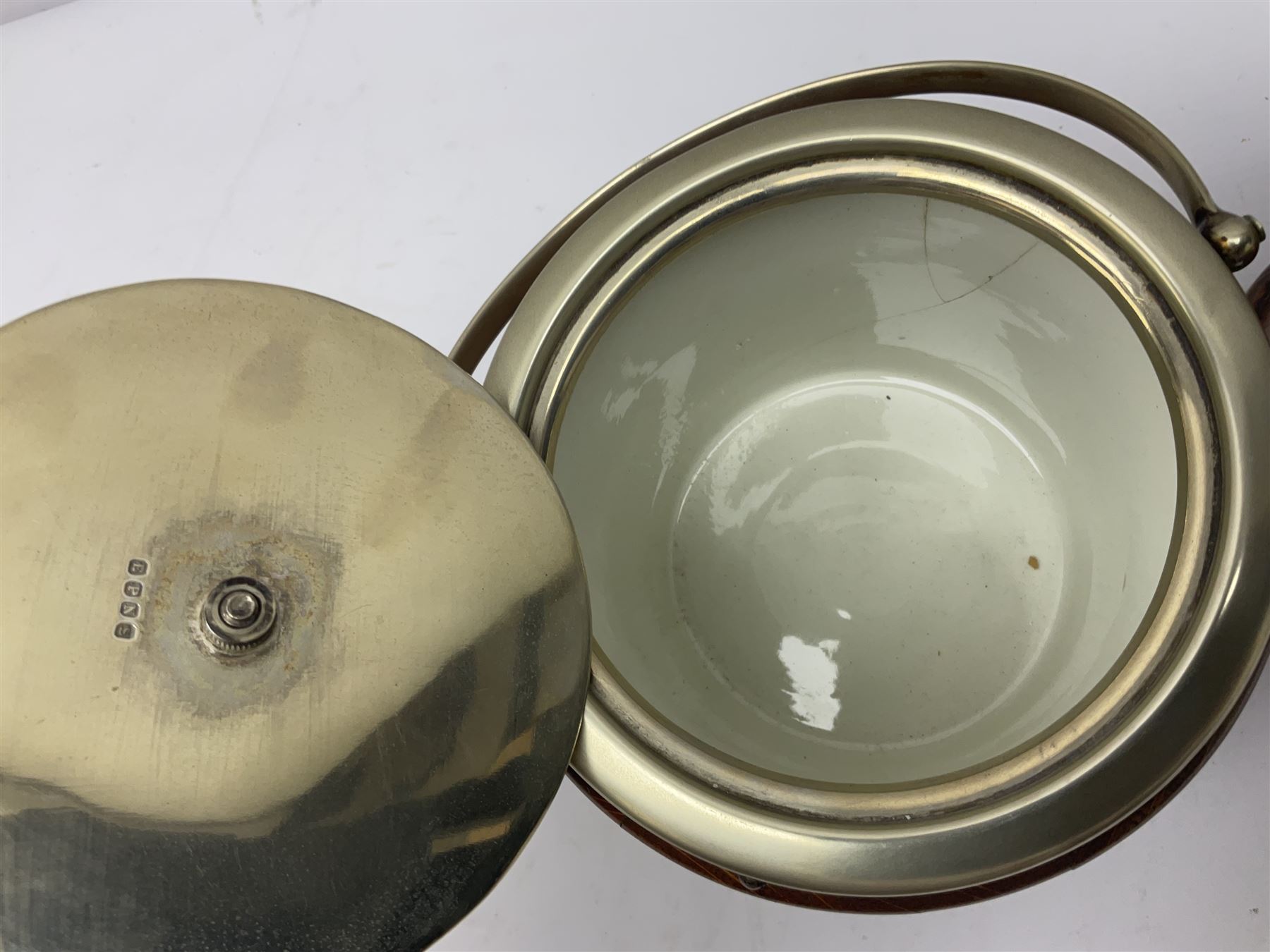 Five early 20th century biscuit barrels with silver-plated mounts, one made from Mahogany from HMS Hindustan
