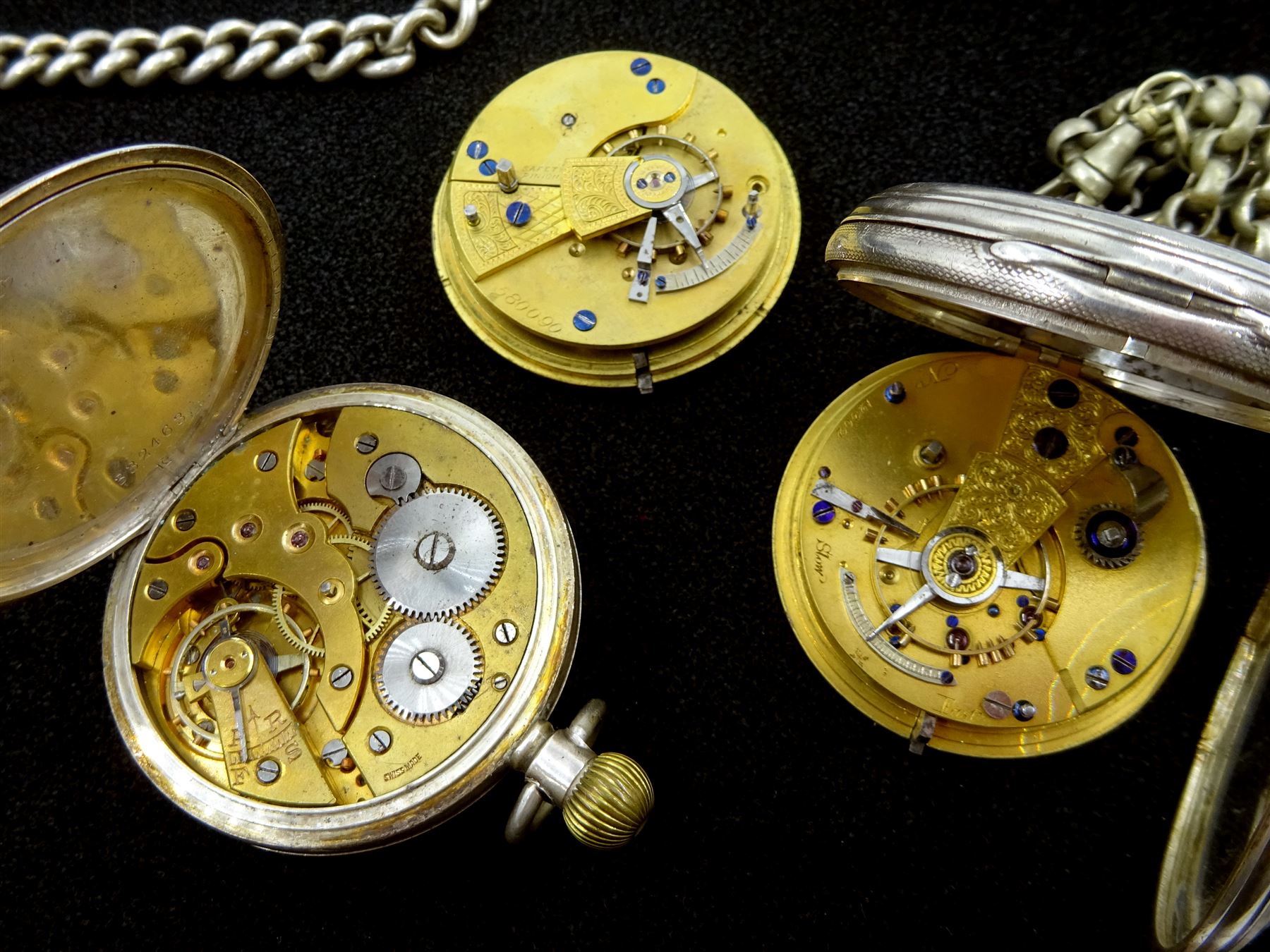 Edwardian silver fusee lever pocket watch by Bravingtons, case by William Ehrhardt, Birmingham 1912, on silver Albert chain, Victorian silver fusee lever pocket watch, case by James Walker, London 1861, on nickle plated chain, silver keyless lever pocket watch, and a silver manual wind wristwatch, London import marks 1913
