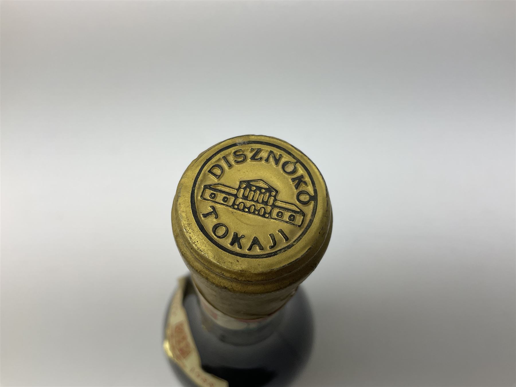 Presentation set comprising Hine Antique cognac 70cl, 40% volume and four miniature bottles of Hine cognac, 1957, 1960, two 1982, all 5cl, 40%   together with bottle of Tokaji sweet wine, 500ml, 13%