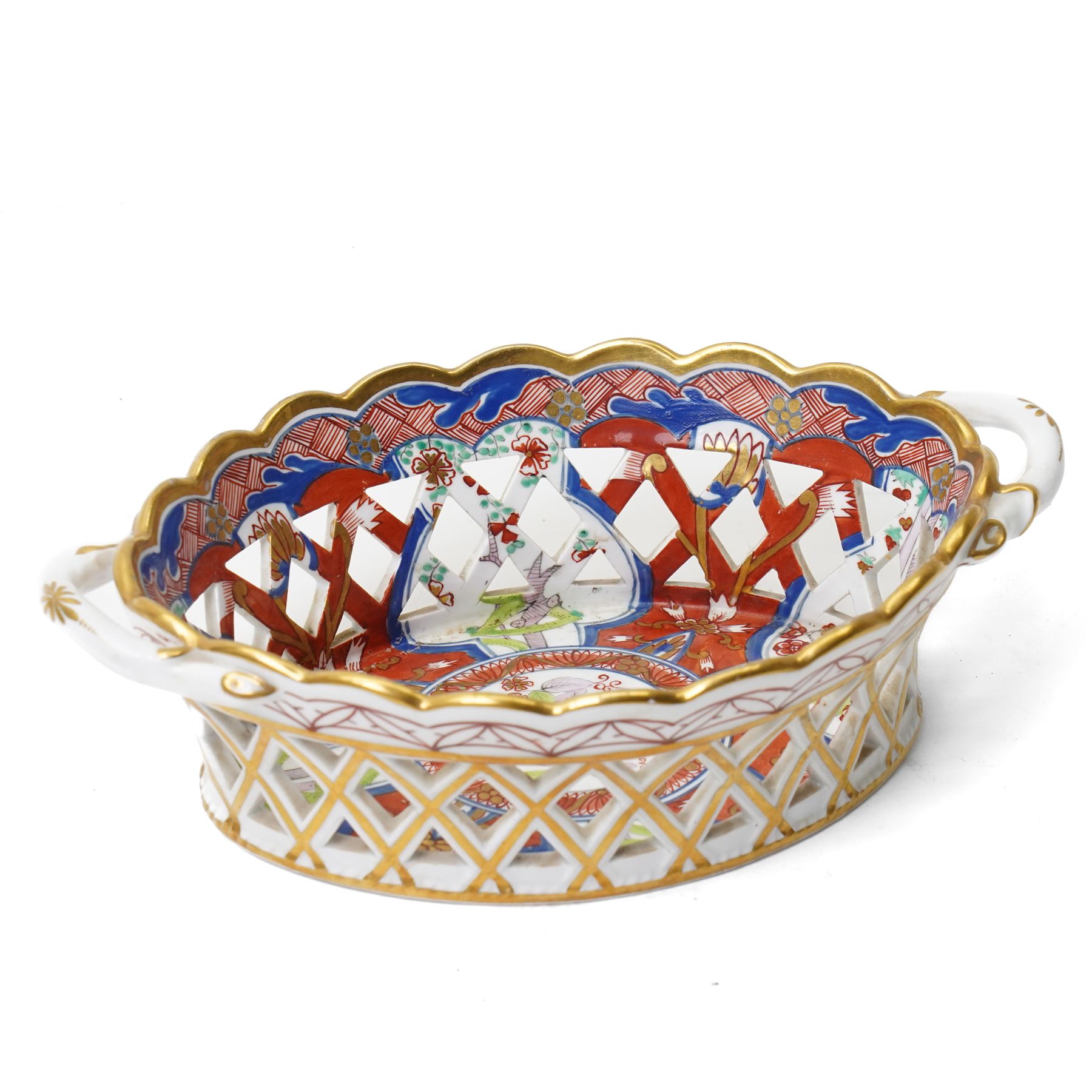 Collection of Spode Imari pattern no. 283 wares, comprising two plates and chestnut basket with stand, basket W20cm