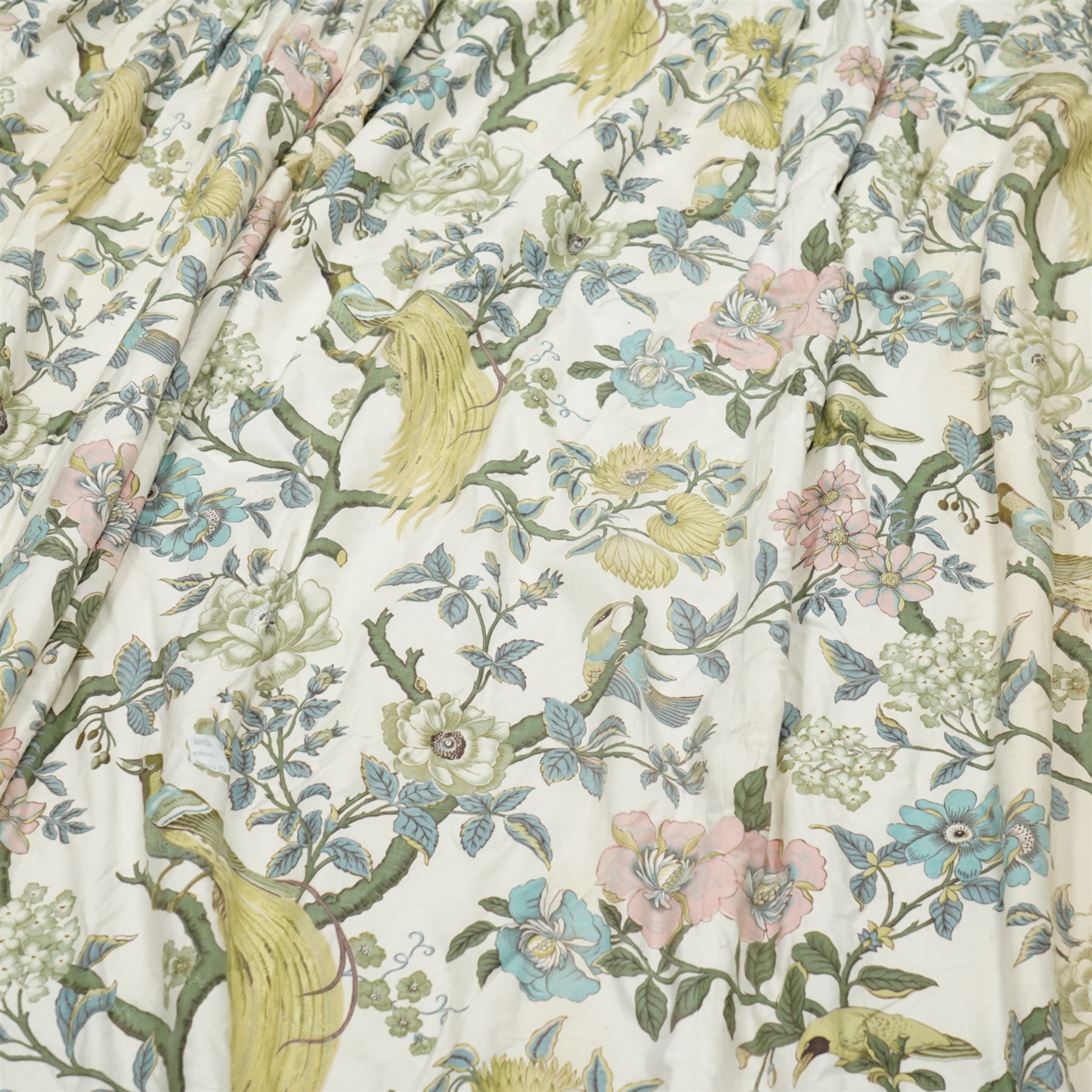 Pair of large quality full length lined and padded ivory ground curtains profusely decorated with birds of paradise and exotic flora, in a predominantly pastel palette

Pelmets W 335cm