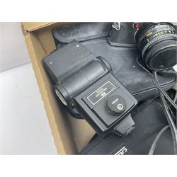 Collection of camera bodies and equipment, including Minolta X-700 camera body with Hoya HMC 55mm Skylight lens, Minolta XG2 camera body etc