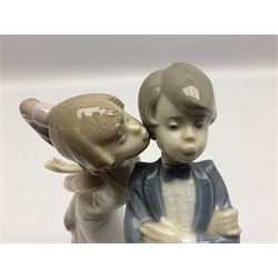 Two Lladro figures, comprising Now & Forever no 7642 and Kiss & Make Up no 5555, largest example H28cm
