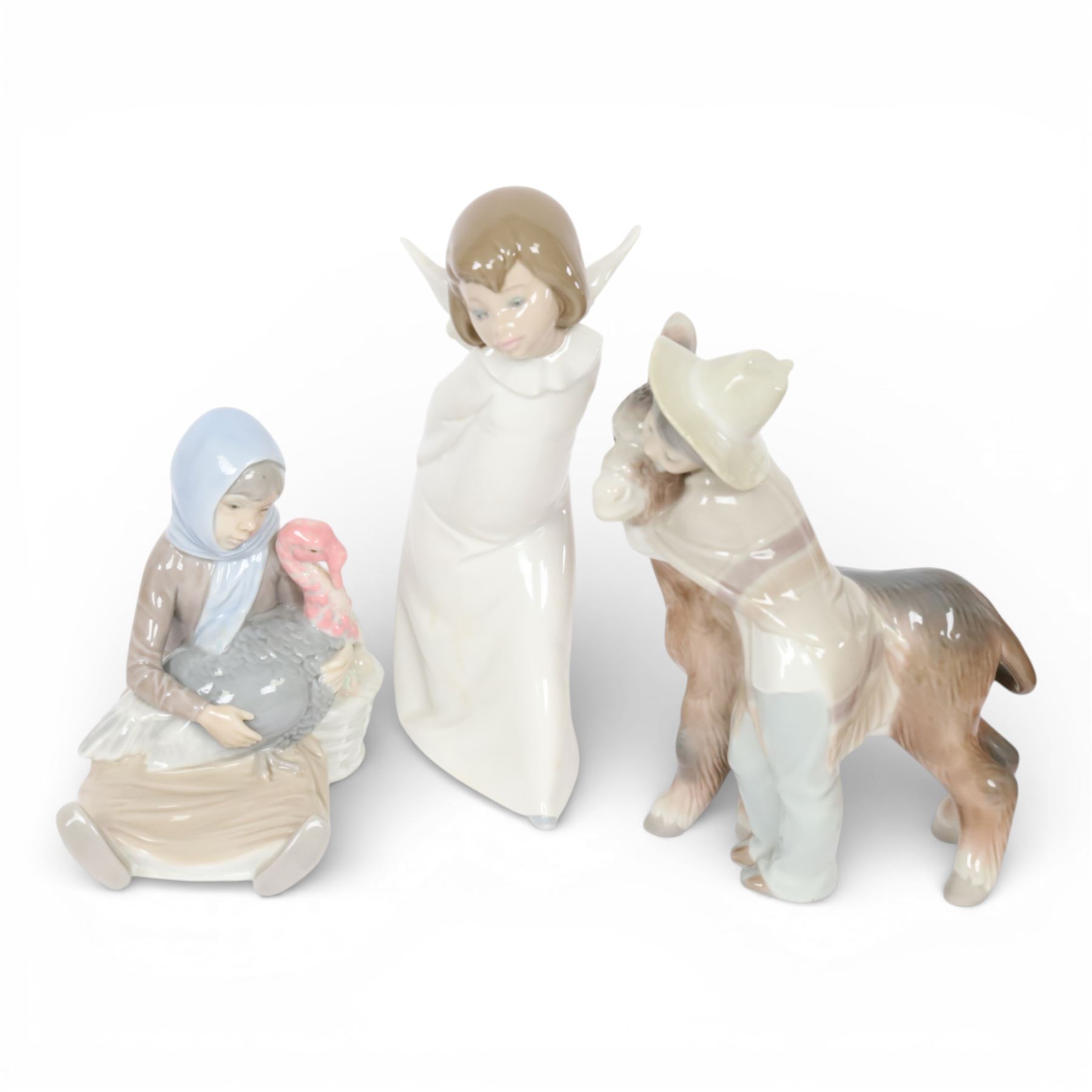 Collection of Lladro including Girl with Turkey 4569, Platero and Marcelino 1181, Eskimo Boy 5238 etc 