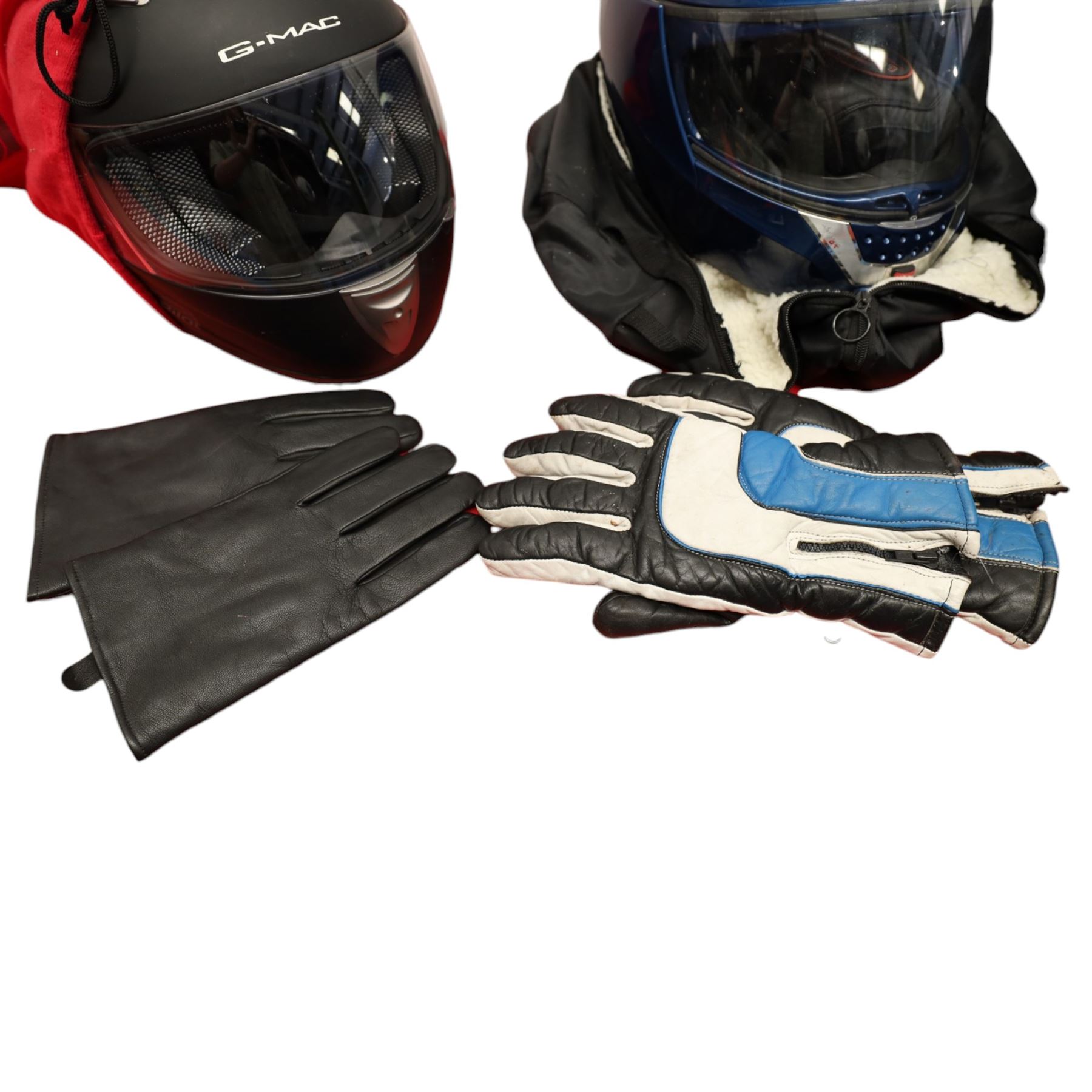 Collection of motorcycle clothing including MCS jacket, two pairs of gloves and two helmets 