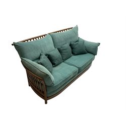 Ercol - 'Renaissance' large two seat sofa, loose cushions upholstered in teal fabric 