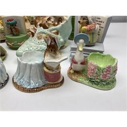 Collection of Border Fine Art studios Beatrix Potter ceramics, to include Enesco jug, Peter Rabbit letterbox money box, Jemima Puddleduck egg cup, Peter in Watering Can figure, Pig Robinson money bank, Schmid musical examples etc, three with boxes