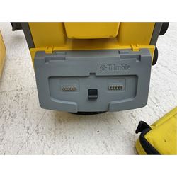 Trimble land surveying equipment - 5000 Series 5603 DR300+ Robotic Reflectorless Total Station, serial no.84310406; in carrying case; together with GPS Holder 58317019, serial no.95320184; ACU 571225500, serial no.83214786; Docking Station 58252019, serial no.95823458 with Power Supply; RMT 606 Remote Target on pole with CU Holder and External Georadio 2.4GHz; cased Power Pack Kit; folding tripod; and aluminium 5m telescopic measuring staff