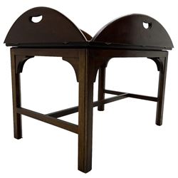 Mahogany butler's tray top coffee table, the removable tray with hinged sides and ends pierced with handles, on square moulded supports united by H stretcher 