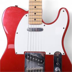 Fender Telecaster electric guitar, serial no. T021384 made in Japan c.1994, with Candy Apple Red body, white scratch plate and maple neck, guitar L98cm