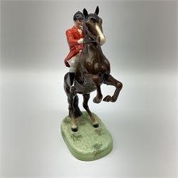 A Beswick model of a huntsman on rearing horse, model no 868 2nd edition, with printed mark beneath, H25cm. 