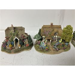 Fifteen Lilliput Lane models, including The Nineteenth Hole, Cowslip Cottage, The Lion Mongers, Going For a Song and Old Crofty, Gossip Gate and Beehive Cottage, all with deeds and original boxes (15)