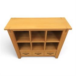 Contemporary Oak cabinet, rectangular top with tenon detailing, two open recess shelves, above a single drawer with blackened metal handles