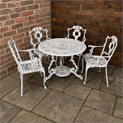 Victorian design cast aluminium circular garden table and four armchairs, ornate grape design in antique white paint