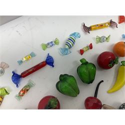 20th century glass fruit, including bananas, peppers, satsumas, etc together with a large collection Murano style glass sweets, of various size and design