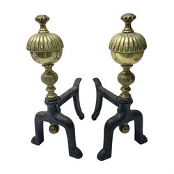 Pair of metal fire dogs, with fluted spherical finials, H34cm