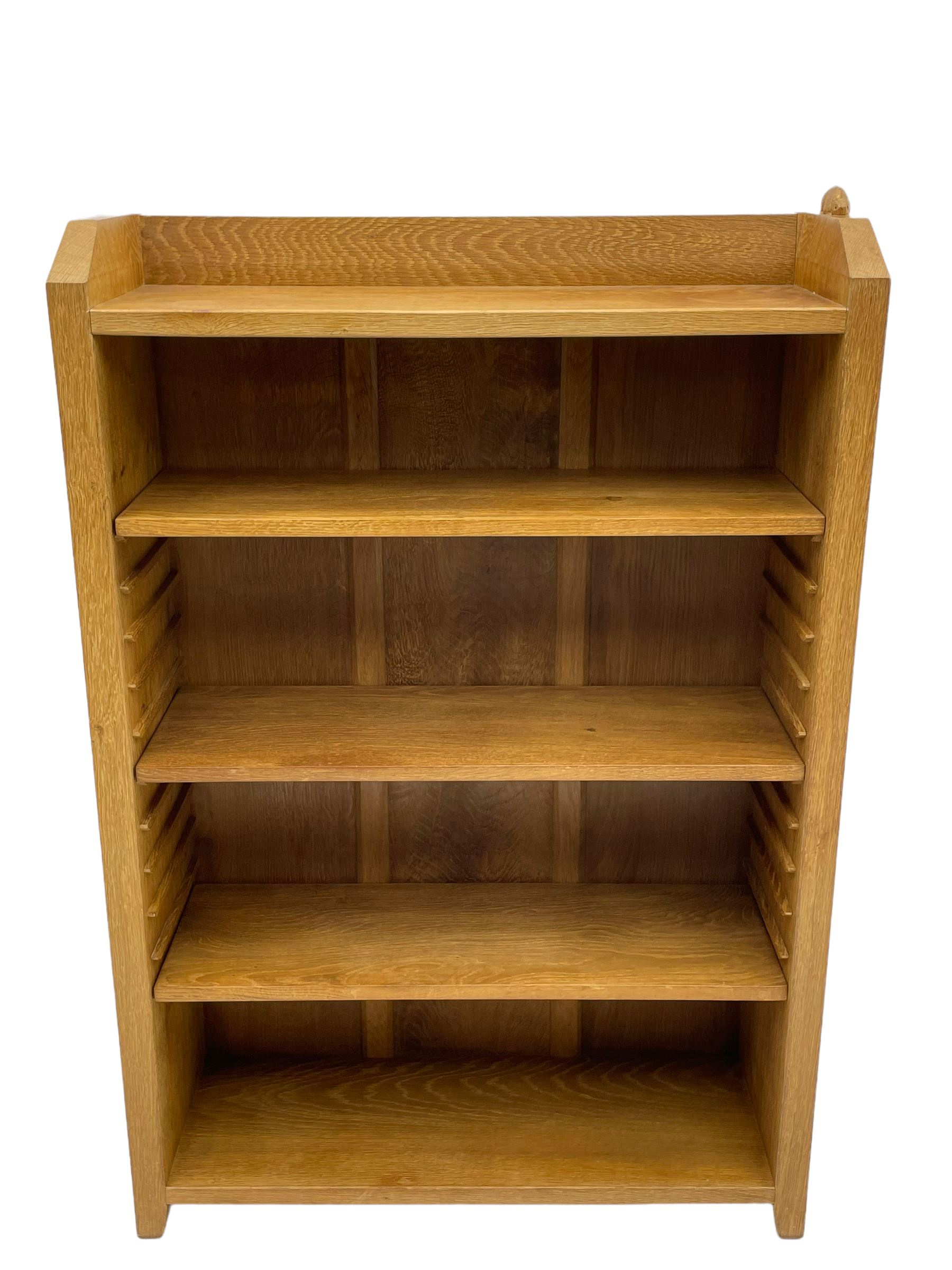 'Rabbitman' oak bookcase, fitted with three adjustable shelves, the top carved with rabbit signature, by Peter Heap of Wetwang