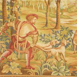 Large French Aubusson style verdure tapestry, of 18th century design but later, depicting a hunting party in a country landscape, 175cm x 271cm