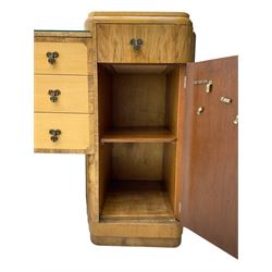 Early 20th century Art Deco twin pedestal sideboard, the pedestals fitted with single drawer over single cupboard enclosing shelf, flanking three central drawers with a figured band 