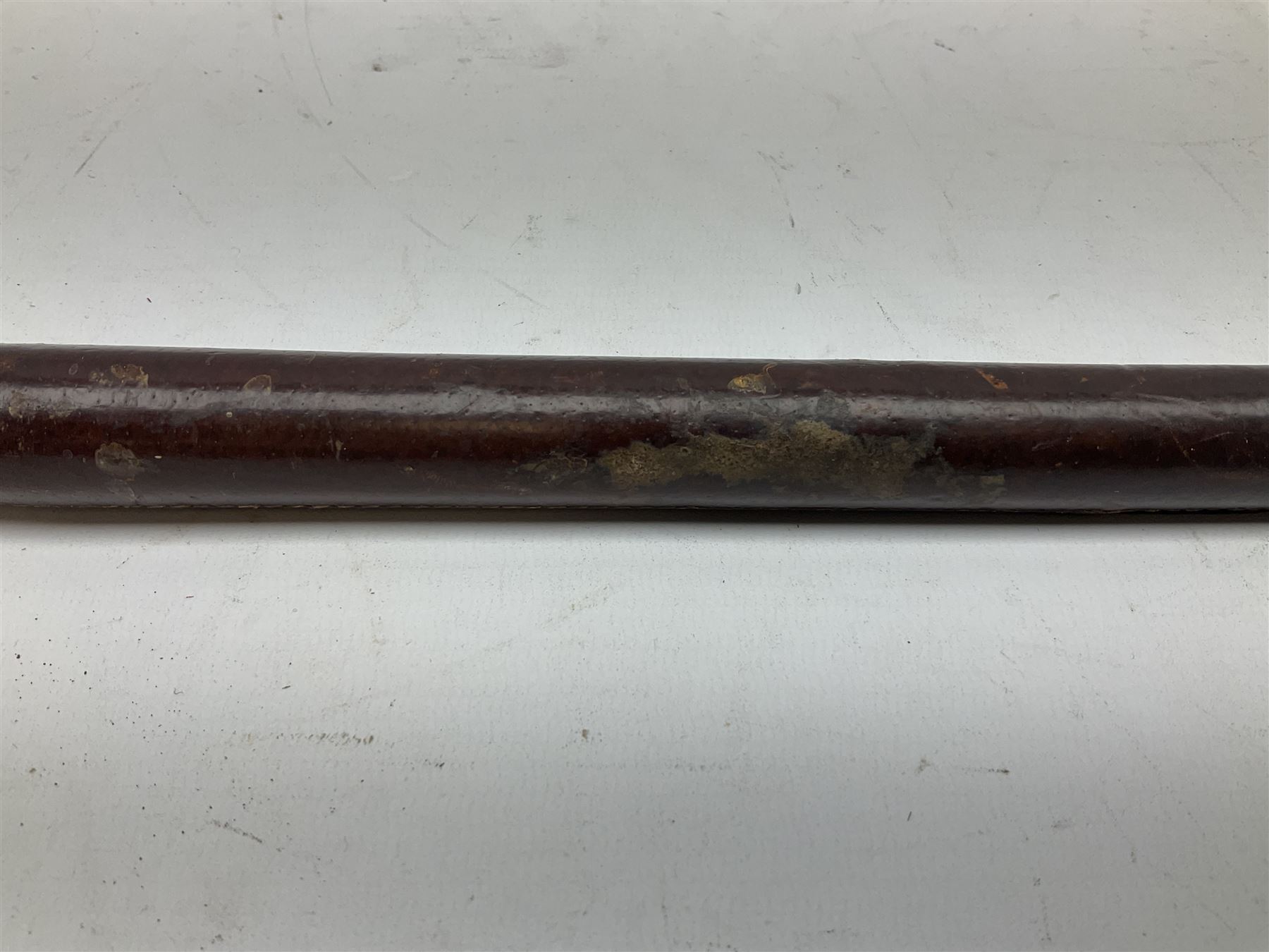 Early 20th century officer's swagger type leather covered sword stick, the 33cm etched single fullered blade marked Wilkinson Pall Mall, with carrying strap L60.5cm
