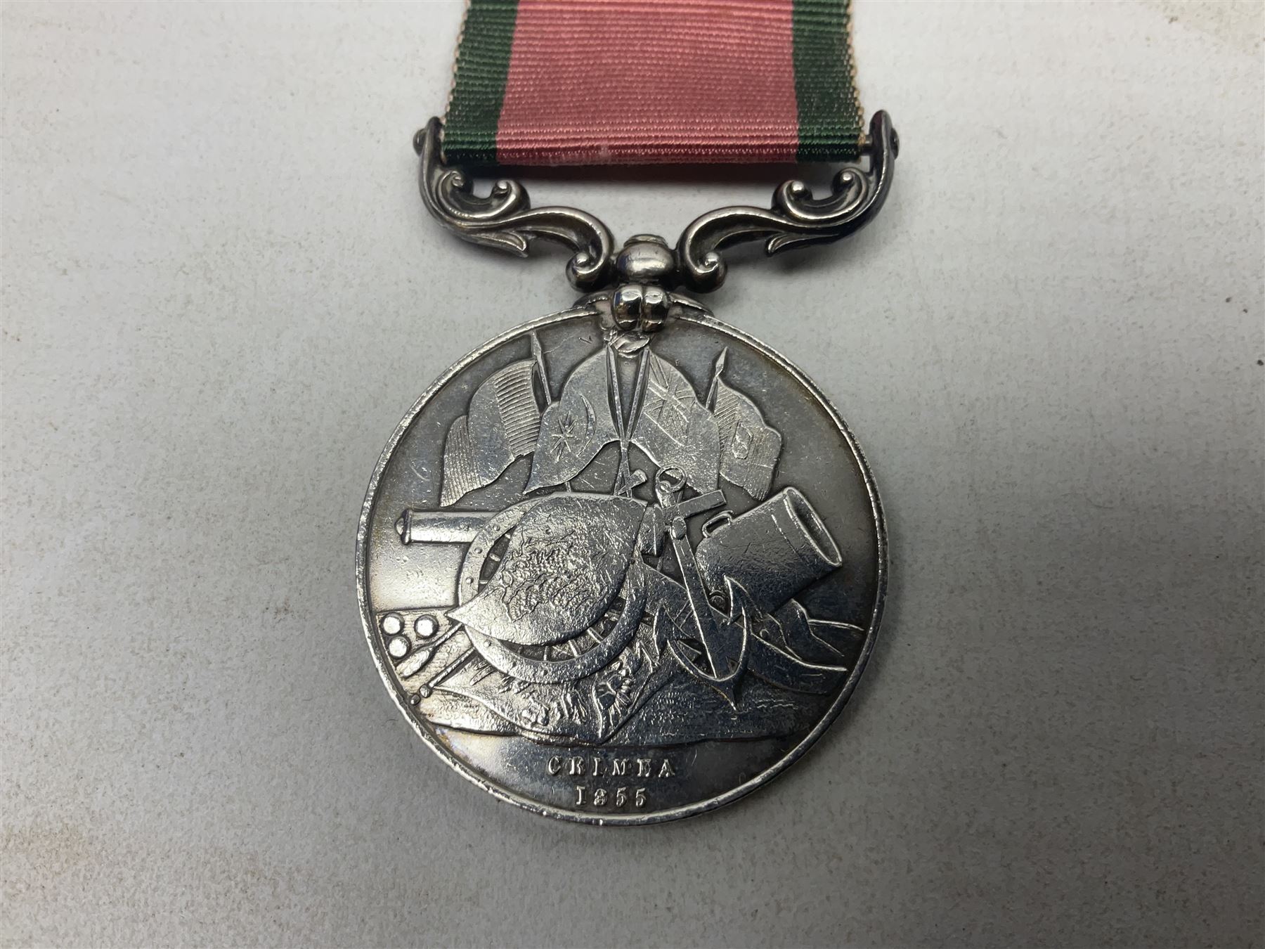 Turkish Crimea Medal 1855, unnamed, fitted with scrolling suspension bar and ribbon