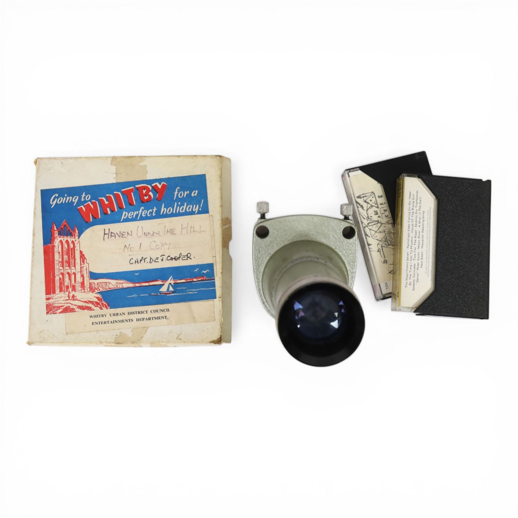Aldis projector and a collection of local interest slides, formerly belonging to Captain Denis Cooper the Entertainments Manager Whitby for 21 years, contained within a leather carry case 