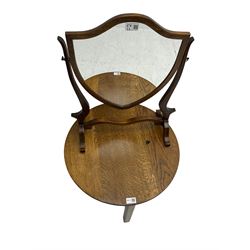 Early 20th century circular oak occasional table (D53cm, H46cm), and a Regency style mahogany dressing table mirror (W46cm, H54cm)