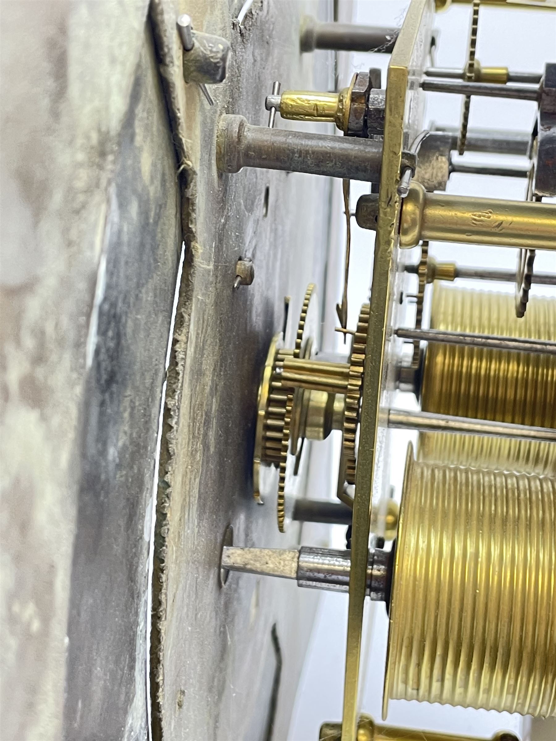 Late 18th century clock movement and dial, square brass dial with Arabic and Roman chapter ring signed 'Thos. (Thomas) Johnston, Dublin', with subsidiary seconds dial and calendar aperture, the dial set with ornate mask cast spandrels, twin train eight day movement striking on bell, with anchor escapement (34.5cm x 34.5cm, 13 1/2