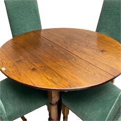 Quality oak circular extending dining table, on turned supports united by x cross stretcher, together with set four matching high back chairs upholstered in green fabric, turned supports joined by turned stretchers (extended length with single leaf 170cm)