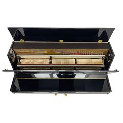 Steinmayer - contemporary upright piano in a black lacquered case, iron over strung frame with an underdamper action, internally operated hammer mute, sustain and Una-corda pedals, with a  6 octave 73 key compass, serial number '551051128'. L122cm