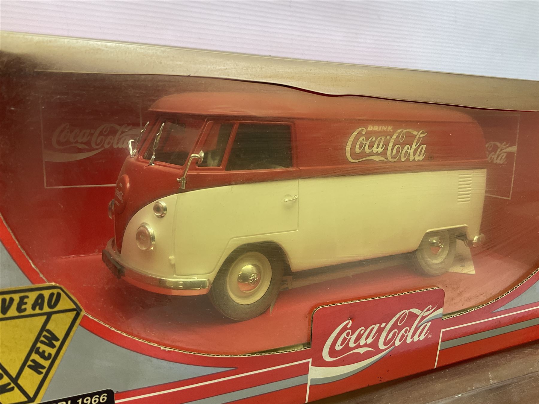 Seven 1:18 scale die-cast models by Ertl, Road legends, Maisto, Solido etc including two Coca Cola promotional vehicles; five boxed (7)