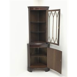 Mid century mahogany corner display cabinet, single door enclosing shelves above single cupboard, W66cm, H182cm, D43cm