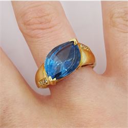 14ct gold marquise shaped London blue topaz ring with diamond set shoulders, stamped 14K 585