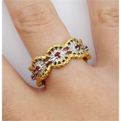 18ct white and yellow gold ruby open flower design eternity ring, stamped 750