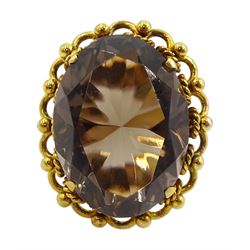 14ct gold single stone large oval smokey quartz ring, stamped
