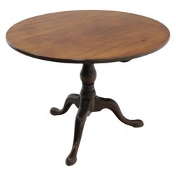 19th century quality mahogany tripod table, the circular tilt top supported on a turned baluster column with downswept cabriole legs carved with flower heads and terminating in pad feet