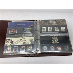 Mostly Queen Elizabeth II mint decimal stamps in presentation packs, face value of usable postage approximately 100 GBP, housed in three ring binder folders