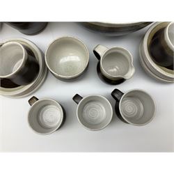 Marianne De Trey (British 1913-2016) stoneware coffee service for twelve, together with a large deep stoneware footed bowl and ladle with wood handle, all decorated in Manganese 'Pattern 1' with impressed shell marks, bowl D27cm