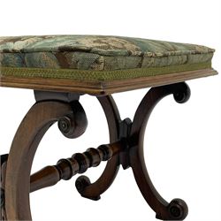 Regency rosewood stool, cushioned seat upholstered in floral needle work in moulded frame, curved x-framed supports with scrolled terminals, united by turned stretcher